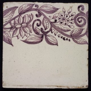 Border tile in purple with sling decoration of two flowers, leaves, yellow pottery, edge tile wall tile tile sculpture ceramic