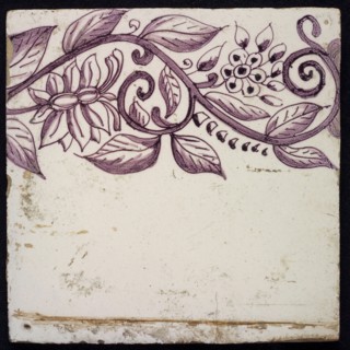 Border tile in purple with sling decoration of two flowers, leaves, yellow pottery, edge tile wall tile tile sculpture ceramic