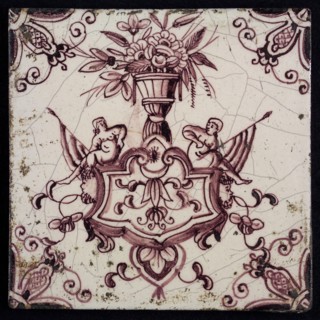 tile manufacturer: Aalmis, Cartouche tile, flower vase with flowers, corner motif spider, wall tile tile sculpture ceramic