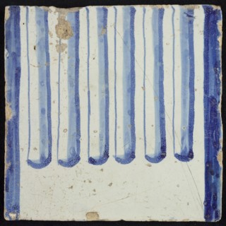 Tile of chimney pilaster, blue on white, part of column with cannelure, chimney pilaster tile pilaster footage fragment ceramic