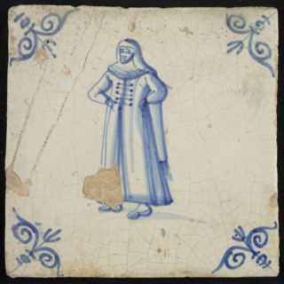 Figure tile, standing nun, corner motif oxen head, wall tile tile sculpture ceramic earthenware glaze, baked 2x glazed painted