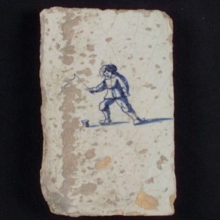 Scene tile, child's play, spinning, wall tile tile sculpture ceramic earthenware glaze, baked 2x glazed painted Blue on white