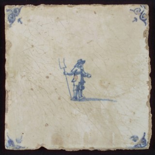 Figure tile, man with pitchfork, corner motif ox's head, wall tile tile sculpture ceramic earthenware glaze, baked 2x glazed
