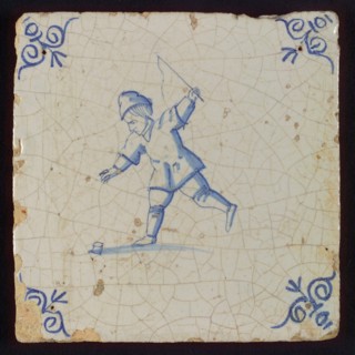Scene tile, child's play, child with toll, corner motif ox's head, wall tile tile sculpture ceramic earthenware glaze, baked 2x