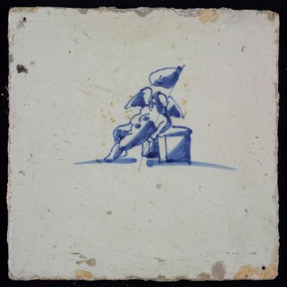 White tile with blue putto, wall tile tile sculpture ceramic earthenware glaze, baked 2x glazed painted
