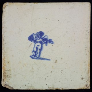 White tile with blue putto, wall tile tile sculpture ceramic earthenware glaze, baked 2x glazed painted, I