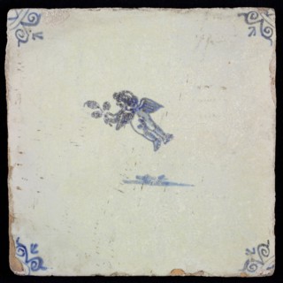 White tile with blue flying putto; corner pattern ox head, wall tile tile sculpture ceramic earthenware glaze, baked 2x glazed