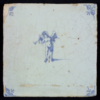 Light blue tile with blue putto with wind instrument; corner pattern ox head, wall tile tile sculpture ceramic earthenware glaze