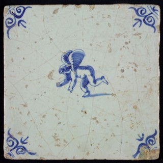 White tile with blue putto; corner pattern ox head, wall tile tile sculpture ceramic earthenware glaze, baked 2x glazed painted