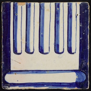 Tile of chimney pilaster, blue on white, part of column with cannelure and basement, chimney pilaster tile pilaster footage