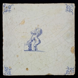 White tile with blue putto; corner pattern ox head, wall tile tile sculpture ceramic earthenware glaze, baked 2x glazed painted