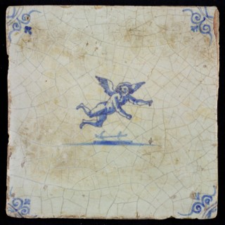White tile with blue flying putto; corner pattern ox head, wall tile tile sculpture ceramic earthenware glaze, baked 2x glazed