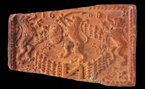 Hearthstone, from Antwerp Belgium, with narrow frame, with lion in Dutch garden, fireplace stone part ceramics brick, baked