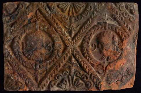 Hearthstone, from Antwerp Belgium, without frame, with male and female head, fireplace stone fireplace part ceramics brick 10,5