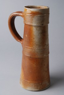 Brown stoneware schnelle with three bands of profile rings, schnelle beer mug drinking utensils tableware holder soil find