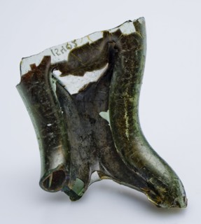 Fragment of 'Kuttrolf', 'Glückerflasche' or squeeze bottle, bottle holder bottomfound glass, free blown and formed Fragment