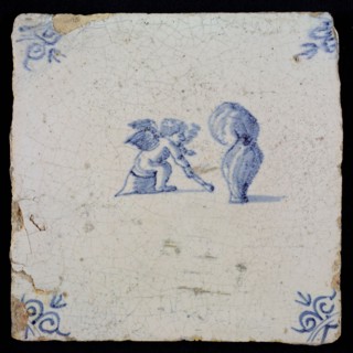 White tile with blue putto; corner pattern ox head, wall tile tile sculpture ceramic earthenware glaze, baked 2x glazed painted