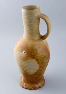 High stoneware jug, gray glazed with brown spots, on squeeze foot, jug crockery holder soil find ceramic stoneware glaze salt