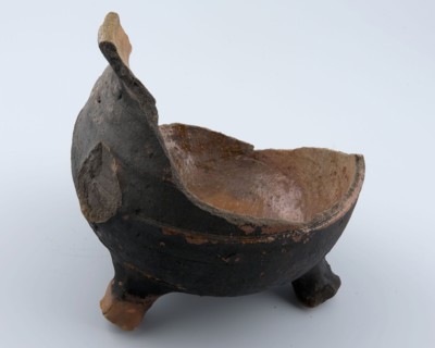 Fragment of the cooking jug on three legs, grape cooking pot crockery holder kitchen utensils earthenware ceramics earthenware