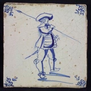 White tile with blue warrior; corner pattern ox head, wall tile tile sculpture ceramic earthenware glaze, baked 2x glazed