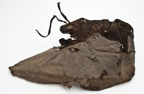 Fragment pointy shoe, consisting of heel, side with lace holes and lacing and front, shoe footwear clothing soil finding leather