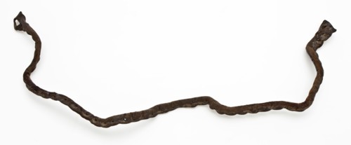 Leather shoe outlets, narrow, folded with over the entire length sewing holes on both ends, shoe footwear clothing fragment soil