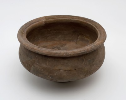 Small brown pot on narrow stand, baluster shape with grooved top edge, Roman pottery, pot holder soil find ceramic pottery, hand