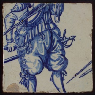 Tile of tableau with in blue torso of soldier, tile picture footage fragment ceramics pottery glaze, baked 2x glazed painted