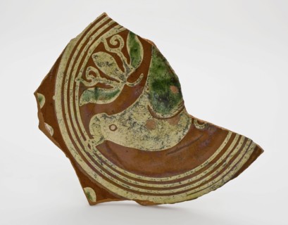 Fragment earthenware dish decorated in sludge technology with circles and bird, dish plate crockery holder soil find ceramic