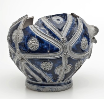 Fragment of Westerwald jug, rounded ball with swaying grooves over the belly and appliqués, jug crockery holder soil find