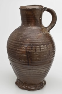 High stoneware jug be used with wheel decoration, standing ear, pinched foot ring, jug be found on the floor ceramic stoneware