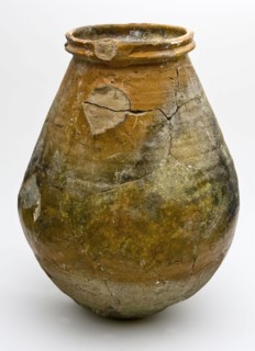 Pottery object, possibly diaper dryer, with holes above the bottom, glazed, pear-shaped, cover up diaper dryer? earth discovery
