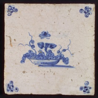 White tile with blue fruit basket with insect, corner motif spider, wall tile tile sculpture ceramic earthenware glaze, baked 2x