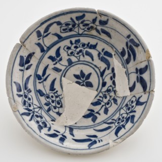 Small faience dish on stand with blue floral decor inside circles, dish plate tableware holder soil find ceramic earthenware