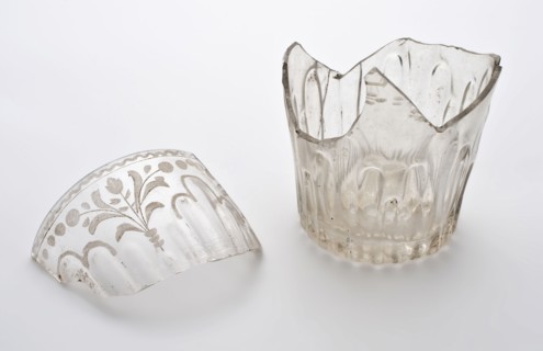 Two fragments of beakers, uneven ribs and floral motifs applied with engraving, cup drinking glass drinking utensils tableware