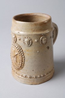 Stoneware beer mug or 'humpe', conical model, appliqué of man with hat, mug drinking bowl tableware holder soil find ceramic