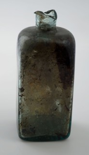 Square (medicine?) Bottle with round shoulders and straight neck, medicine bottle? bottle holder soil find glass, free blown