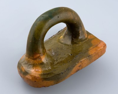 Earthenware iron with sausage-shaped handle, thick surface with rounded front, iron pin soil find ceramic earthenware enamel, h