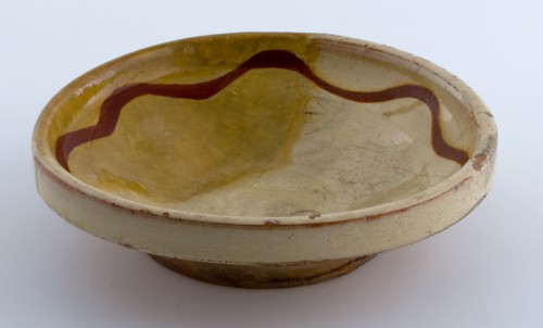 Small earthenware plate, yellow glazed with brown garland along the edge, plate crockery holder soil find ceramic earthenware