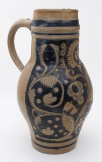 Stoneware jug be decorated with shovel clip and ear, with carved and stylized floral decor, jug crockery holder soil find