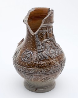 Bartmann jug, also called Bellarmine jug frieze around belly, above and below portrait medallions and acanthus leaves, bearded