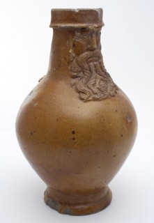 Bartmann jug, also called Bellarmine jug, with Bartmann jug, also called Bellarmine jug, mask and cuff collar around the neck