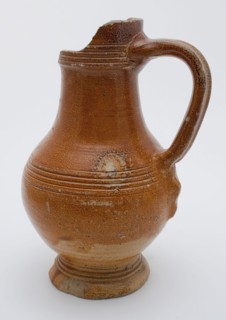 Light brown stoneware jug be used with bands around the neck, belly and foot, jug crockery holder soil find ceramic stoneware