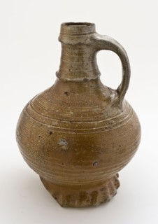 Light brown stoneware jug on pinched foot, pronounced ring around neck and under lip, jug crockery holder soil find ceramic
