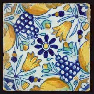Ornament tile with fruit and tulips, rosette in the middle, wall tile tile sculpture ceramic earthenware glaze, baked 2x glazed