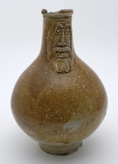 Brown Bartmann jug, also called Bellarmine jug, underside of belly and foot gray, Bartmann jug jug crockery holder soil find