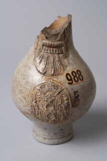 Bartmann jug, also called Bellarmine jug, on stand foot, Bartmann jug, also called Bellarmine jug, mask on the neck and oval