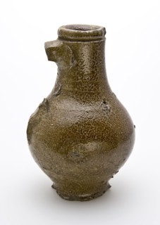 Small stoneware jug with deep lying line under neck edge, bullet-shaped belly, jug holder soil find ceramic stoneware clay