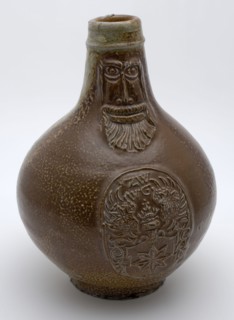 Bartmann jug, also called Bellarmine jug, on the stomach an applique with the coat of arms of Kralingen?, tableware holder soil