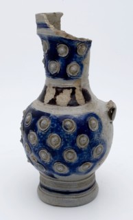 Stoneware jug be put on the belly with small imposed rosettes, purple band around the neck, jug crockery holder soil find